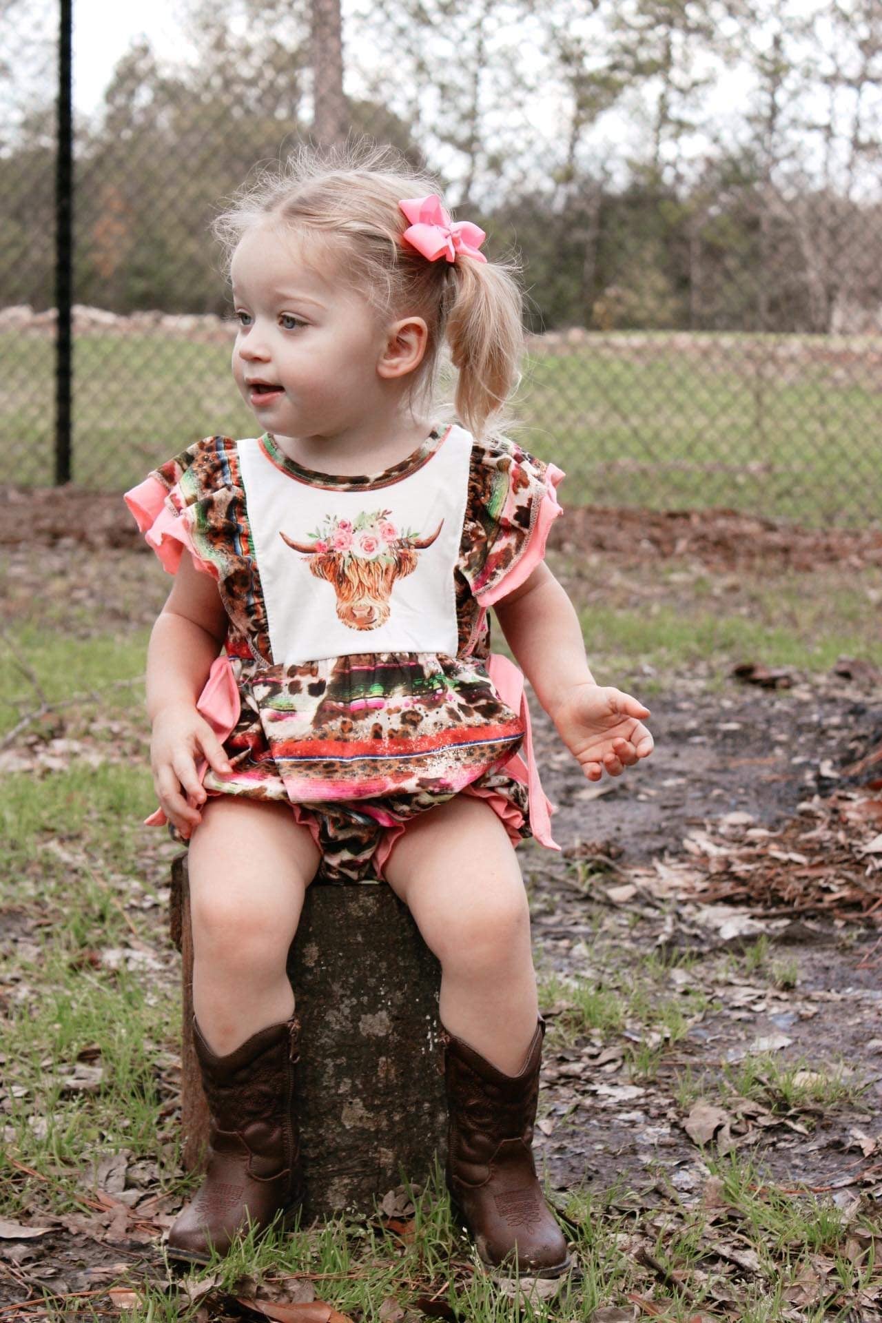 Pink serape cow romper